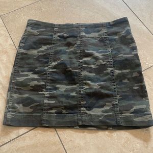 Camo mini skirt.